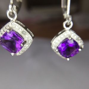 Sterling and genuine Amy earrings with diamonds